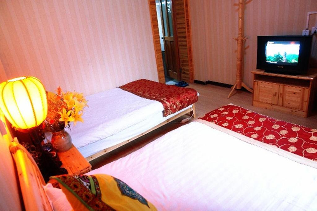 Yunxi Inn Lijiang  Quarto foto